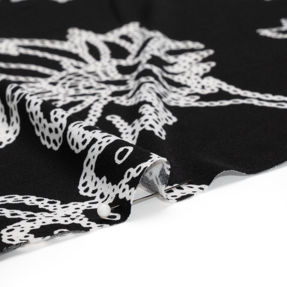 Stretch Polyester Tricot - Black and White Chain Stitch Flowers - Designer Deadstock