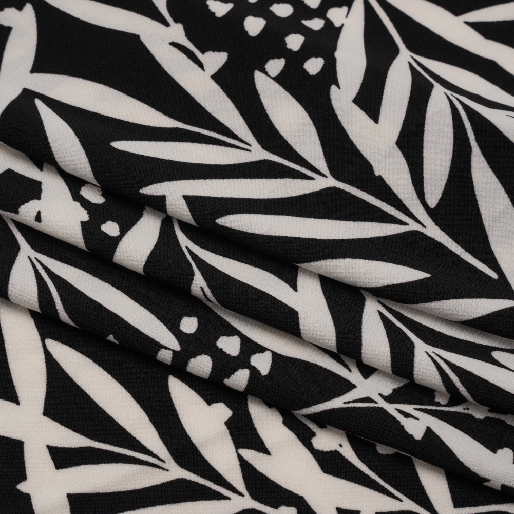 Stretch Polyester Tricot - Black and White Leafy Stems - Designer Deadstock - Folded