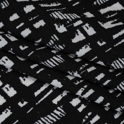 Crinkled Polyester Jacquard Knit - Black and White Abstract Grid - Designer Deadstock Folded