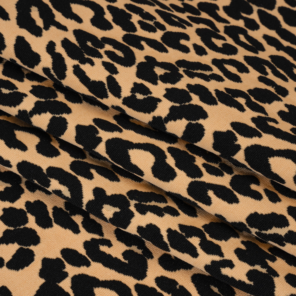 Stretch Polyester Jacquard Knit - Beige and Black Leopard Spots - Designer Deadstock - Folded