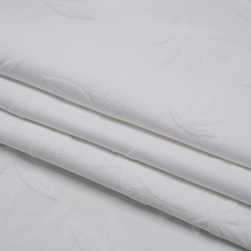Stretch Polyester Jacquard Knit - White Scattered Leaves - Designer Deadstock - Folded