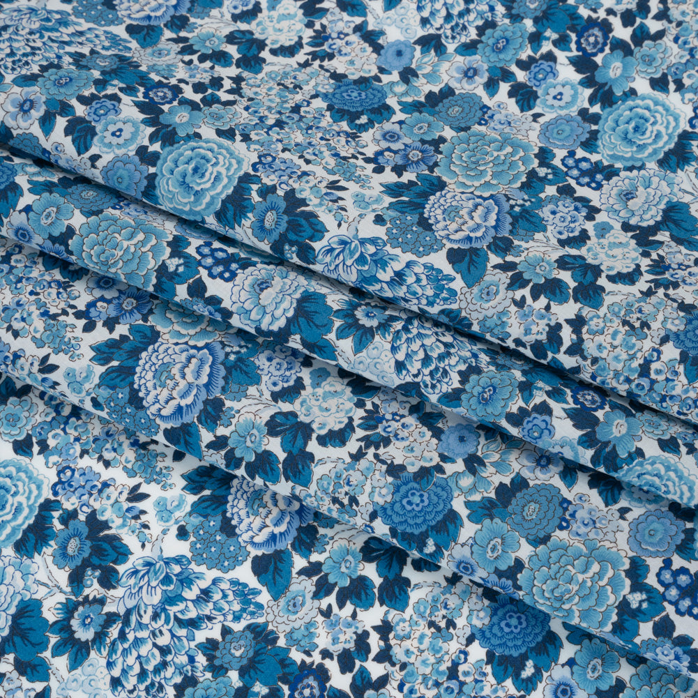 Liberty Fabrics Tana Lawn® - Elysian Day Blue - Sky, Cobalt and White Rosy Blooms - Folded