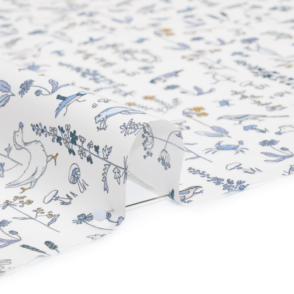 Liberty Fabrics Tana Lawn® - Theo Blue - Baby Blue, Yellow and White Cartoon Creatures and Flowers