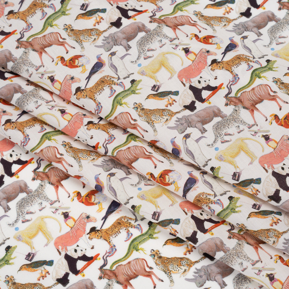 Liberty Fabrics Tana Lawn® - Quey 2 Multi Pastel - Brown, Green and Yellow Animals with Clothes - Folded