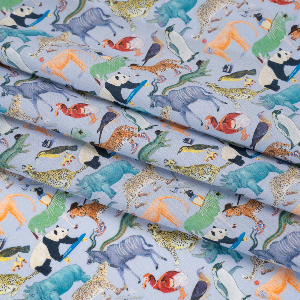 Liberty Fabrics Tana Lawn® - Quey 2 Multi Bright - Blue, Yellow and Green Animals with Clothes - Folded