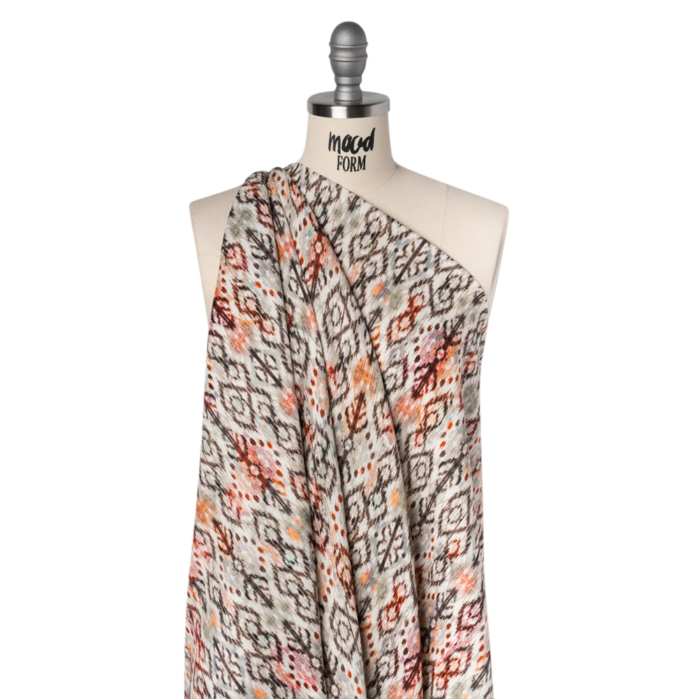 Slubbed Gauzy Cotton Woven - Red, Orange and Dark Green Geometric Ikat - Mood Exclusive Secret Symbols Print