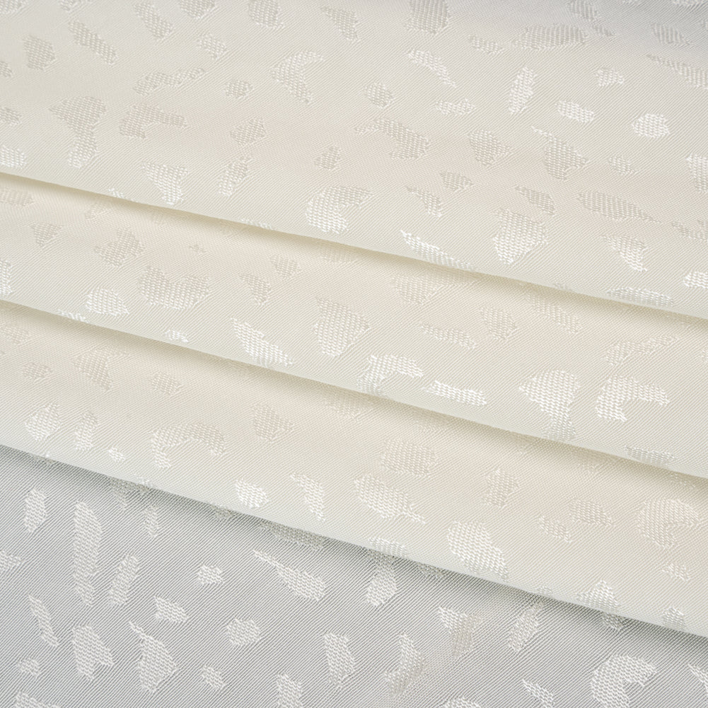 Sustainable Viscose Cheetah Spots Jacquard - Ivory - Mood Exclusive Zerene Collection - Folded
