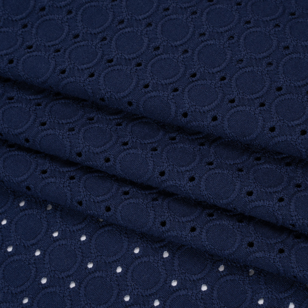 Stretch Polyester Embroidered Eyelet Jersey - Deep Sea Blue Circles and Dots - Designer Deadstock - Folded