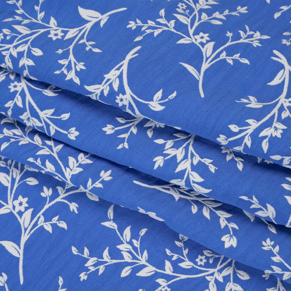 Polyester Woven with Puff Print - Azure Blue and White Foliage - Deadstock - Folded