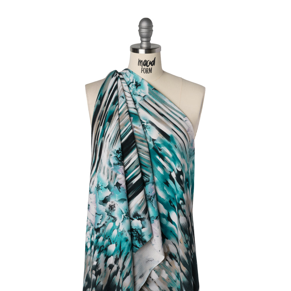 Puckered Stretch Polyester Crepe Double Knit - Teal, Taupe and Black Dripping Flowers Border - Drape