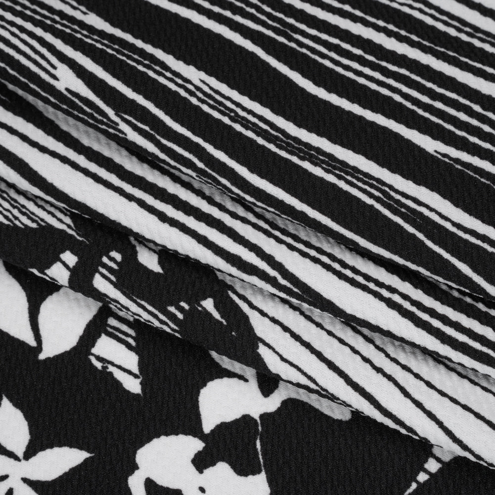 Puckered Stretch Polyester Crepe Double Knit - Black and White Flowers and Stems - Folded
