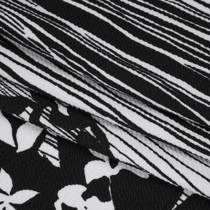 Puckered Stretch Polyester Crepe Double Knit - Black and White Flowers and Stems
