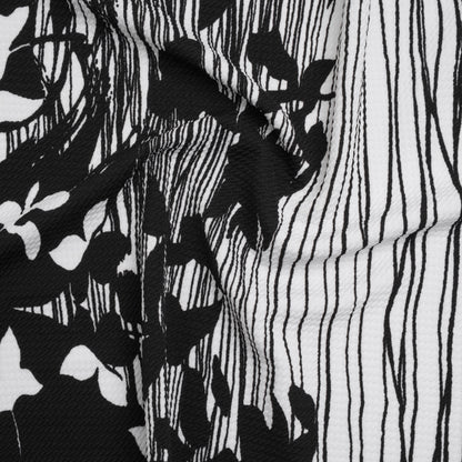 Puckered Stretch Polyester Crepe Double Knit - Black and White Flowers and Stems