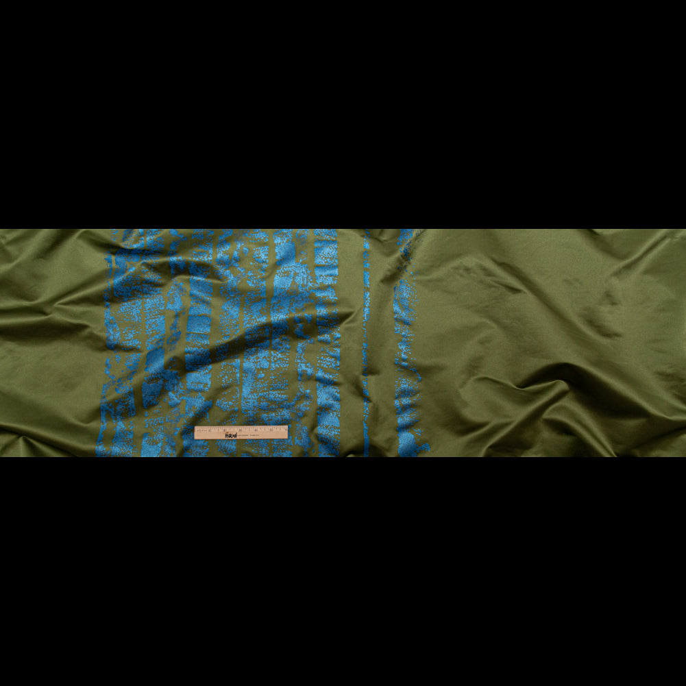 Avocado Green Duchesse Satin with Metallic Stellar Blue Striped Border Print Folded