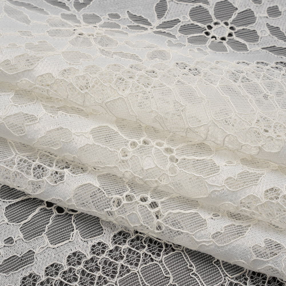 Corded Lace with Eyelash Fringe Edges - Ivory Floral and Geometric Stripes Folded