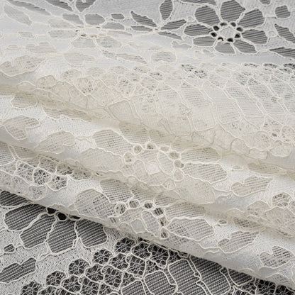 Corded Lace with Eyelash Fringe Edges - Ivory Floral and Geometric Stripes Folded