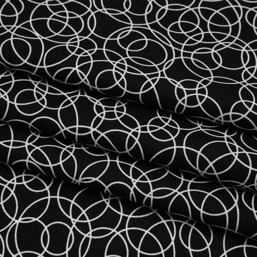 Printed Quilting Cotton by Patrick Lose for Northcott - White on Black Tangled Circles - Basically Black & White Collection - Folded