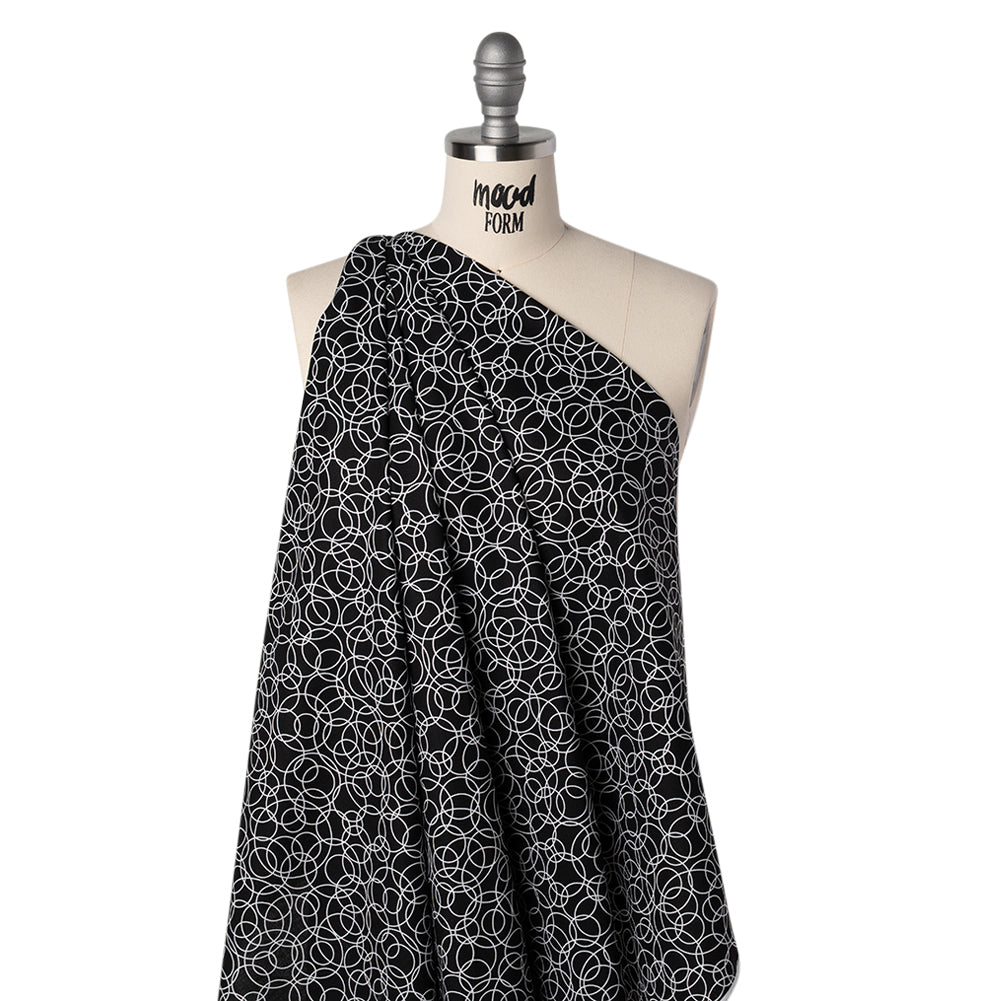 Printed Quilting Cotton by Patrick Lose for Northcott - White on Black Tangled Circles - Basically Black & White Collection - Drape
