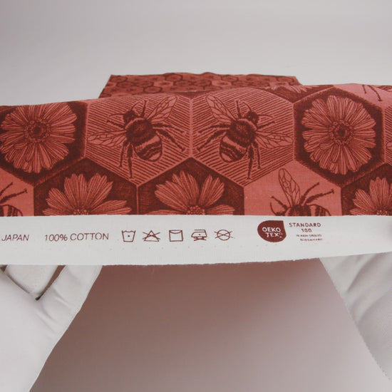 Printed Quilting Cotton by Anna Maria Textiles for Northcott - Coral Busy Bees and Floral Honeycomb - Indelible Ink Collection