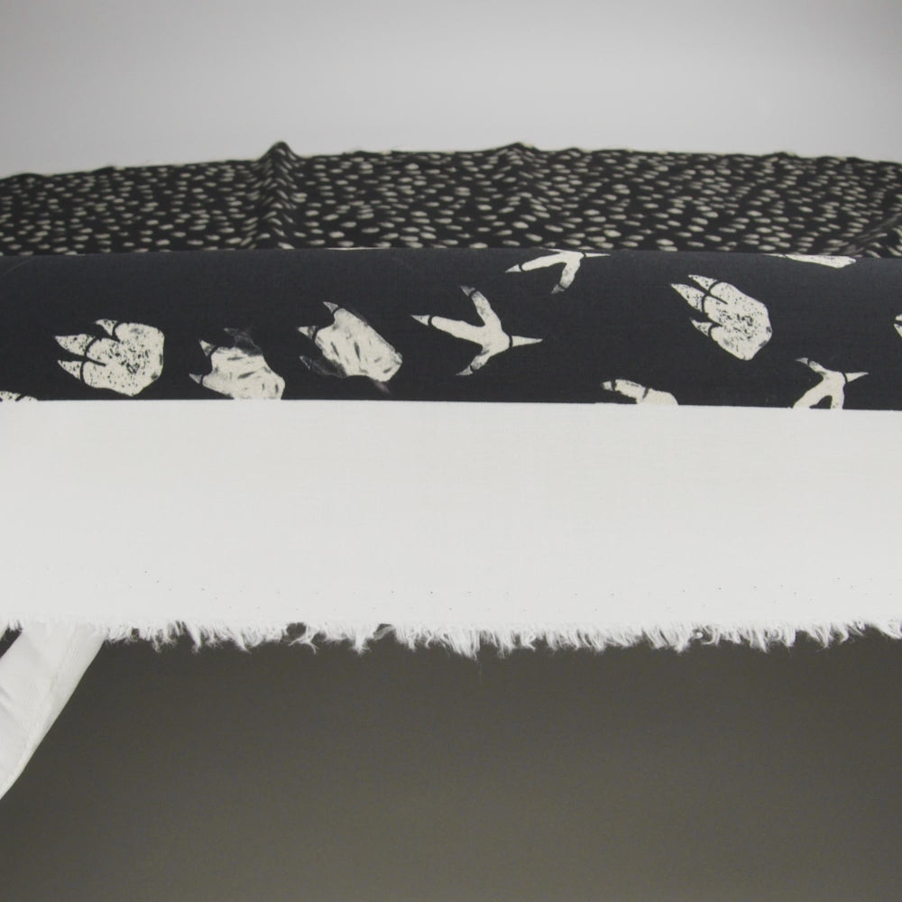 Stretch Cotton Poplin Print - Black Dinosaur Footprints - Mood Exclusive Jurassic Jubilee