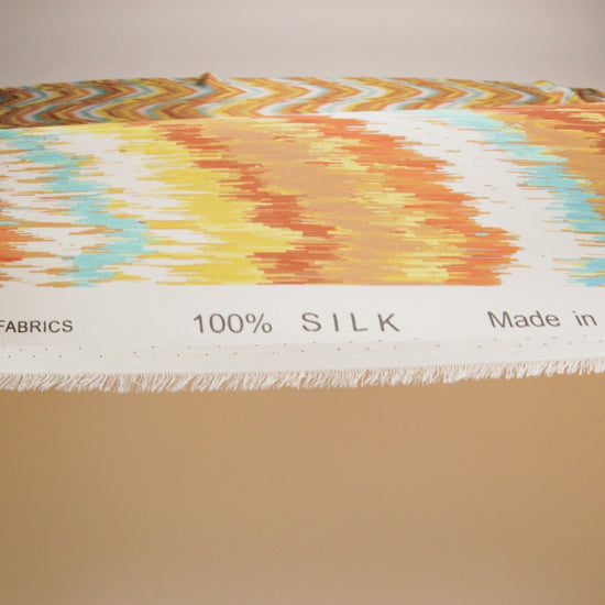 Silk Charmeuse Print 16MM, Made in Italy - Orange, Yellow and Turquoise Ikat Marbled Waves