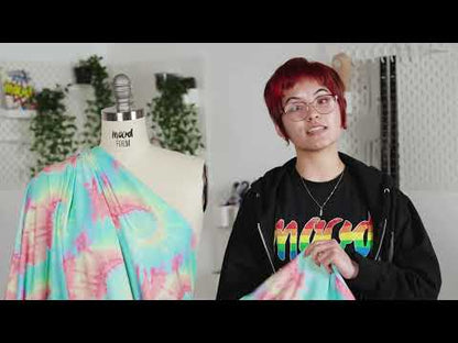 Traje de baño de compresión de tricot, con protección UV y microcápsulas de aloe vera - Estampado tie-dye en suaves remolinos amarillos, rosas y naranjas - Colección Caye