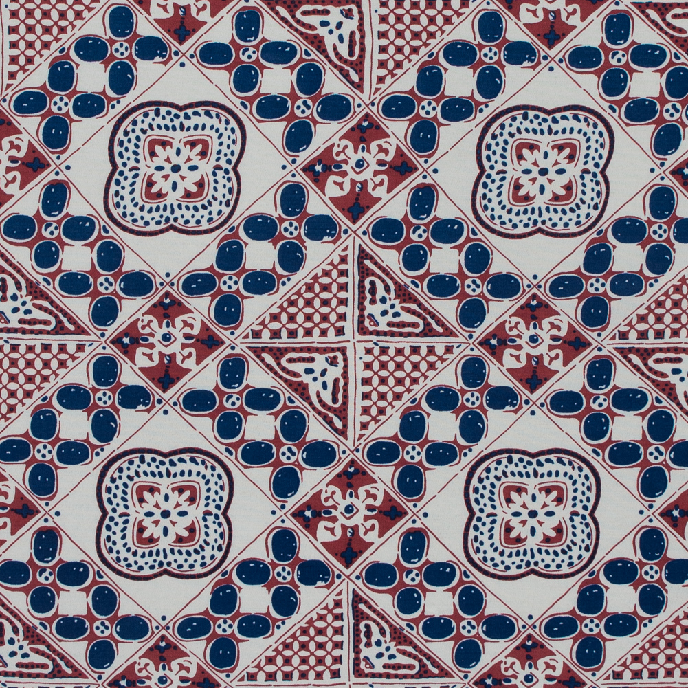 https://www.moodfabrics.com/sea-ny-blue-and-dusty-rose-geometric-rayon-print-317985