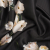 Black and Whisper White Digitally Printed Flowers on a Premium Mikado/Twill | Mood Fabrics