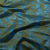 Avocado Green Duchesse Satin with Metallic Stellar Blue Striped Border Print | Mood Fabrics