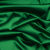 Premium Italian Green Stretch Satin with Black Backing | Mood Fabrics