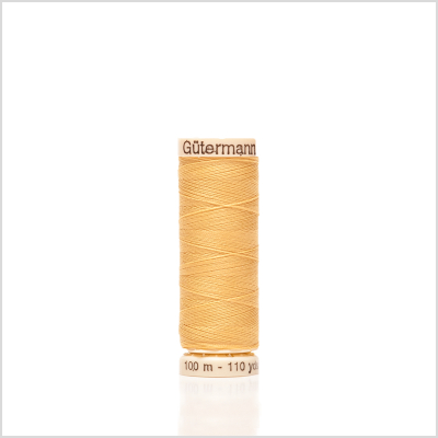 827 Dusty Gold 100m Gutermann Sew All Thread | Mood Fabrics