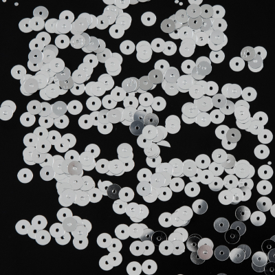 Bag of Silver Color Loose Sequins with Silver Back - 5mm | Mood Fabrics