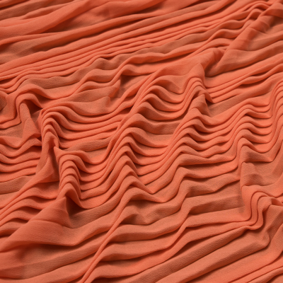 Etereo Tangerine Accordion Pleated Chiffon | Mood Fabrics