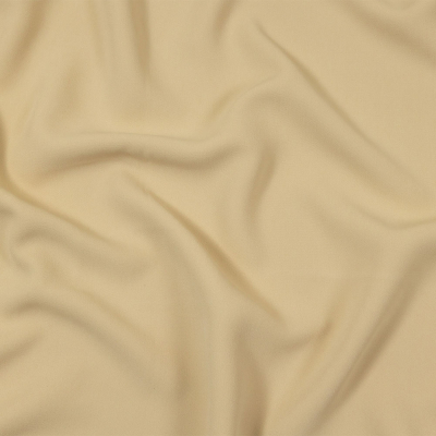 The Row Bleached Sand Compact Rayon Crepe | Mood Fabrics