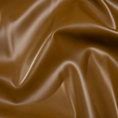 Alida Cognac Faux Upholstery Leather with Brushed Fabric Backing | Mood Fabrics