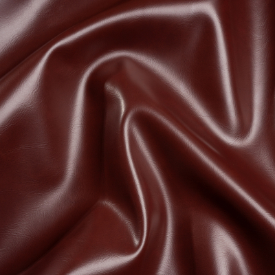 Alida Raisin Faux Upholstery Leather with Brushed Fabric Backing | Mood Fabrics