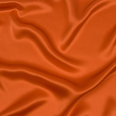 Premium Burnt Orange Stretch Silk Charmeuse | Mood Fabrics