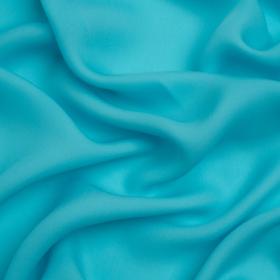 Premium Angel Blue Silk Double Georgette | Mood Fabrics