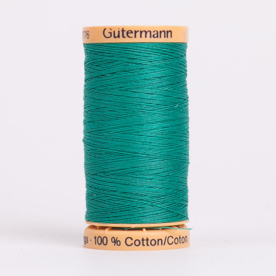7810 Magic Green 250m Gutermann Natural Cotton Thread | Mood Fabrics