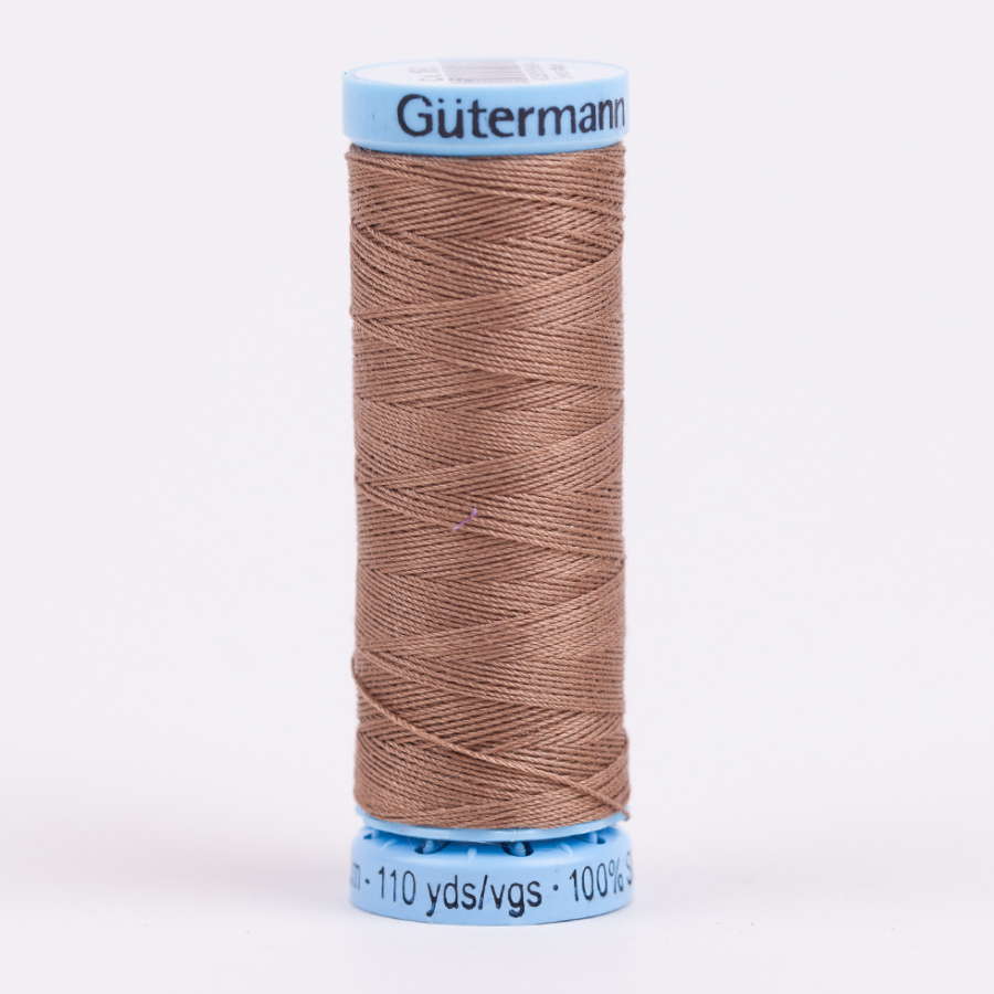180 Dark Beige 100m Gutermann Silk Thread | Mood Fabrics