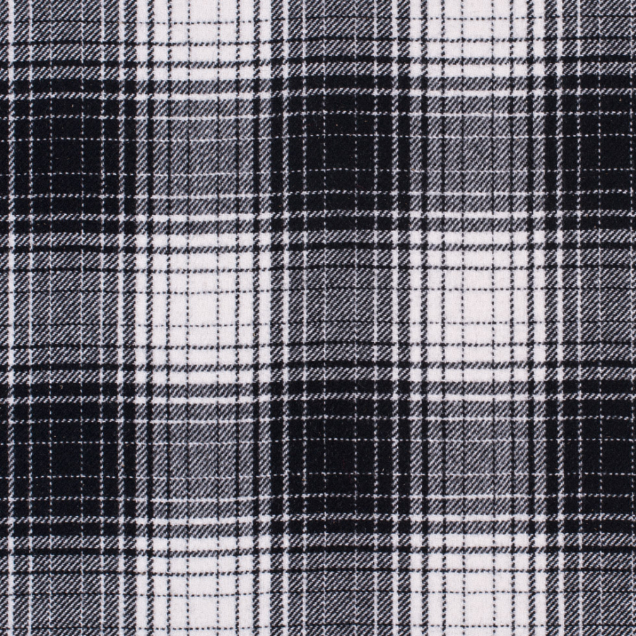 Famous NYC Designer Black and White Plaid Wool Coating | Mood Fabrics