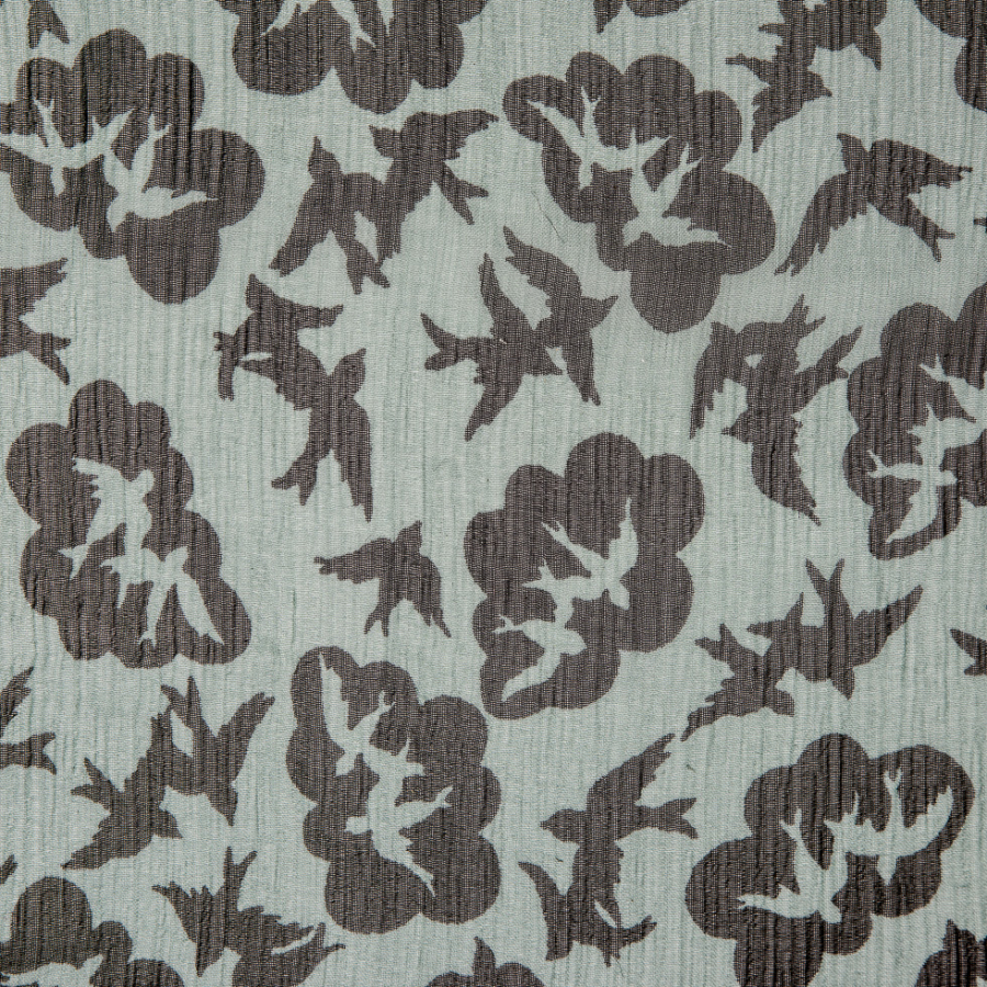 Famous Designer Green/Black Turtledoves Printed on a Crinkled Silk Chiffon | Mood Fabrics