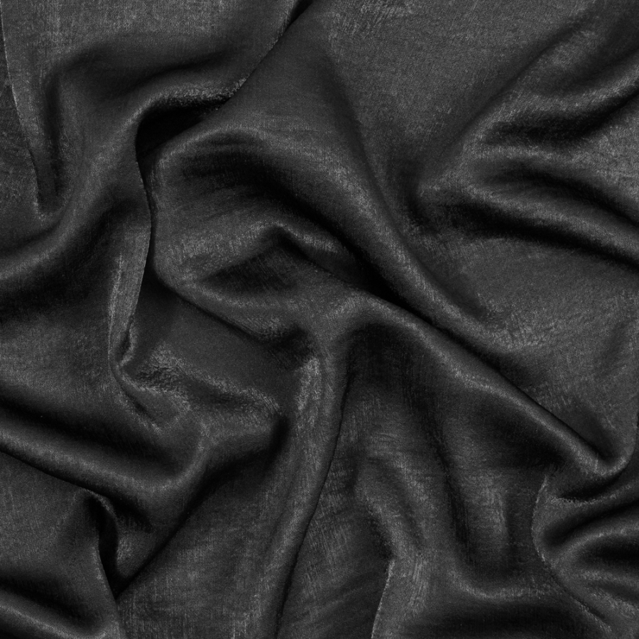 Italian Black Dyed Washed Polyester Dobby | Mood Fabrics
