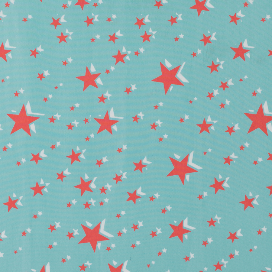 Emberglow Printed Stars on an Aqua Sky Polyester Woven | Mood Fabrics