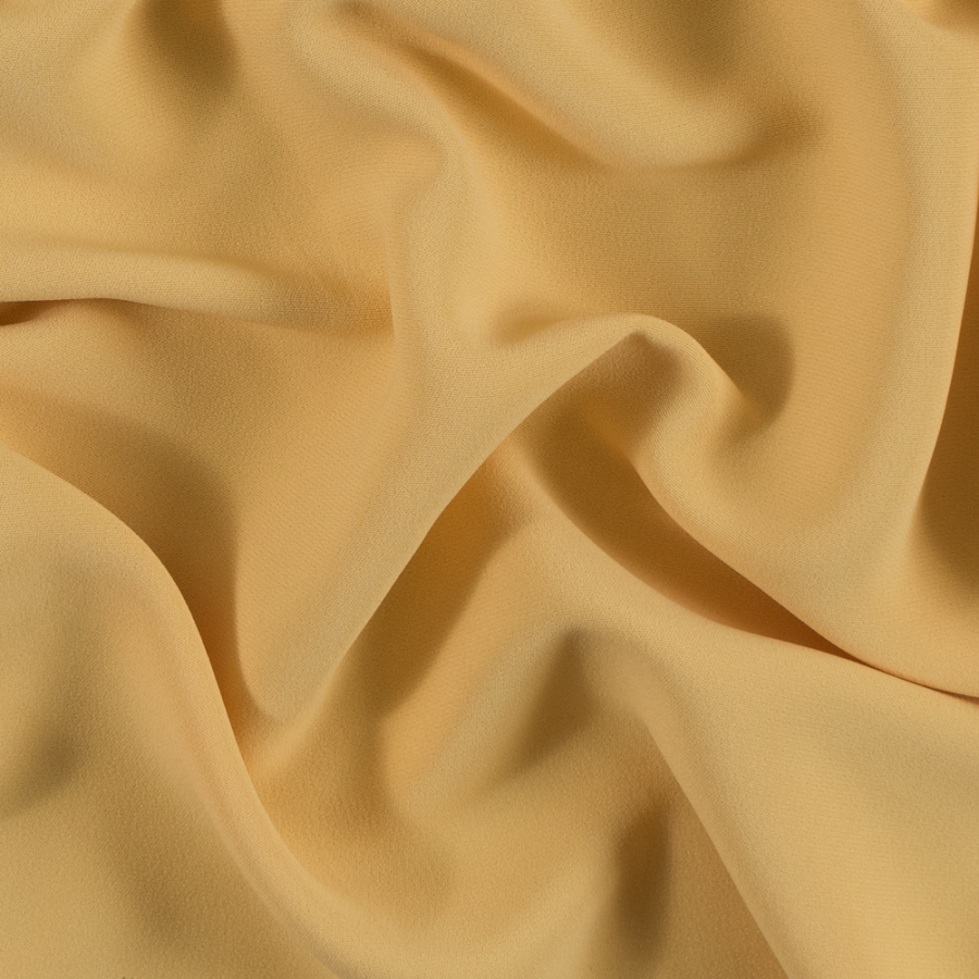 Banana Cream Double Faced Polyester Crepe | Mood Fabrics