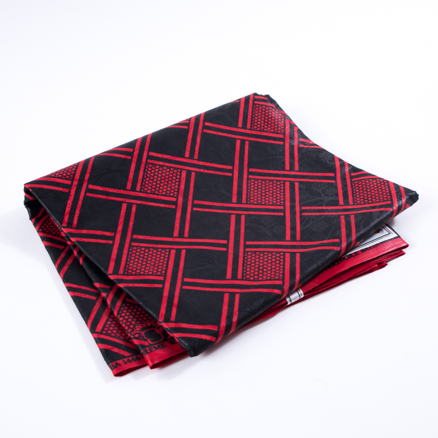 Black and Red Geometric Waxed Cotton African Print with additional Inlaid Print | Mood Fabrics