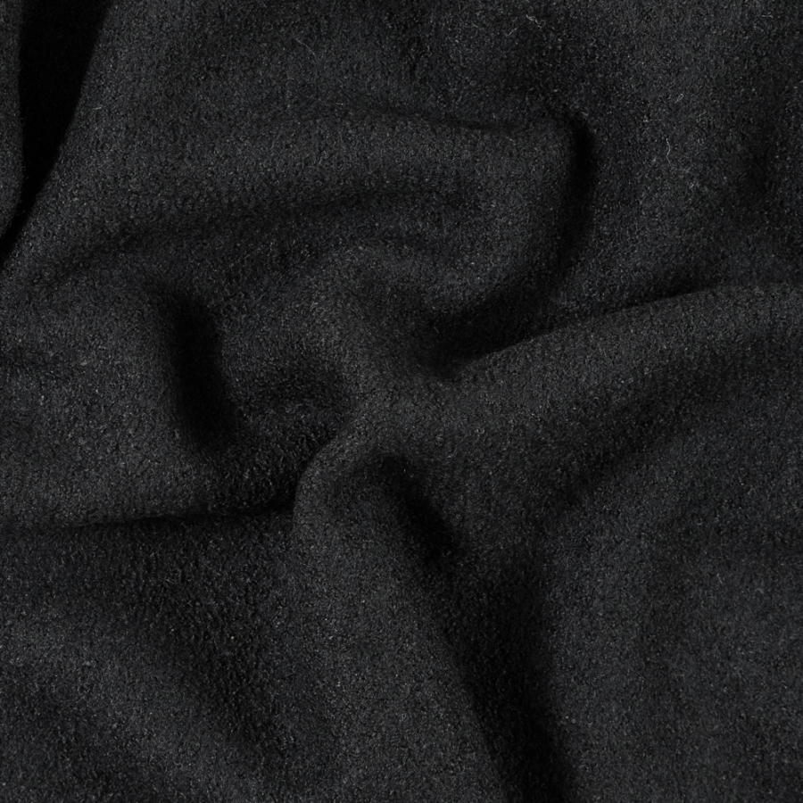Black Solid Boiled Wool | Mood Fabrics