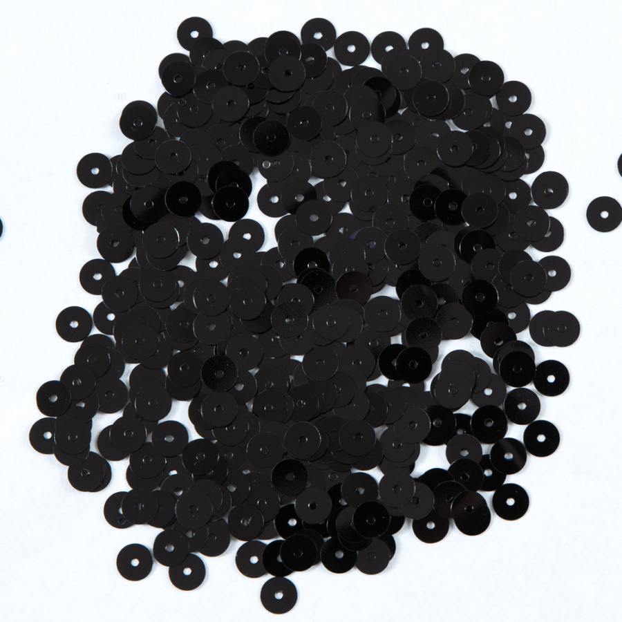 Bag of Black Transparent Bright Loose Sequins - 6mm | Mood Fabrics
