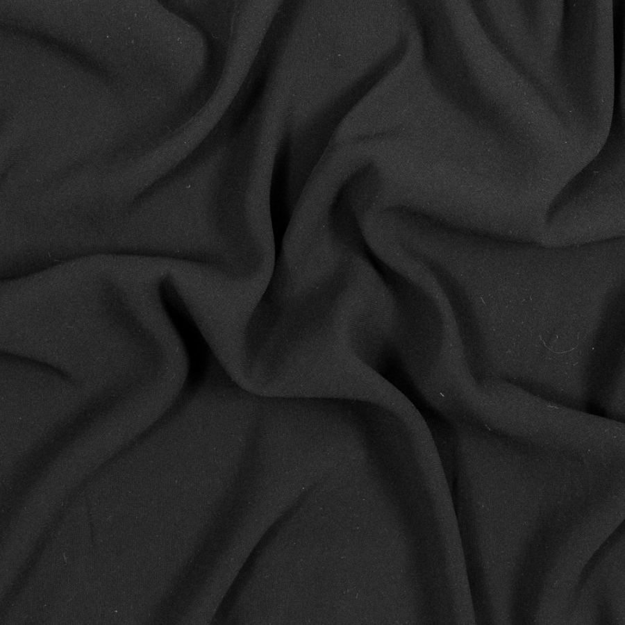 Black Creped Polyester Georgette with Give | Mood Fabrics