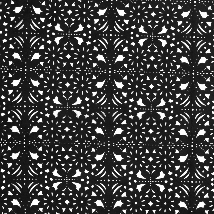 Black Floral Laser-Cut Suede Backed Scuba Knit | Mood Fabrics